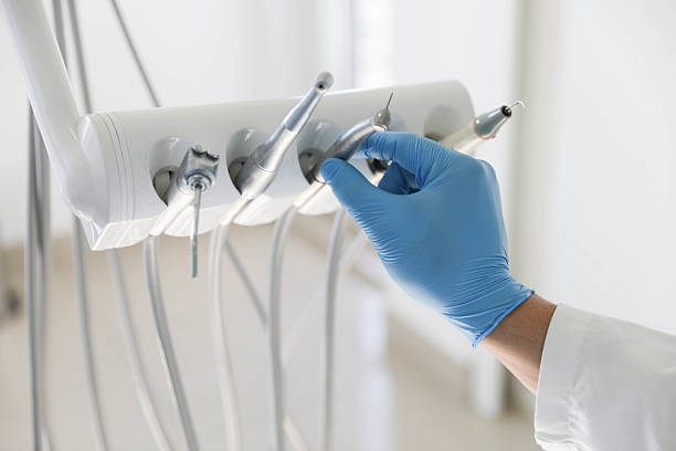 Professional Wisdom Tooth Removal technician working in Home Garden, CA